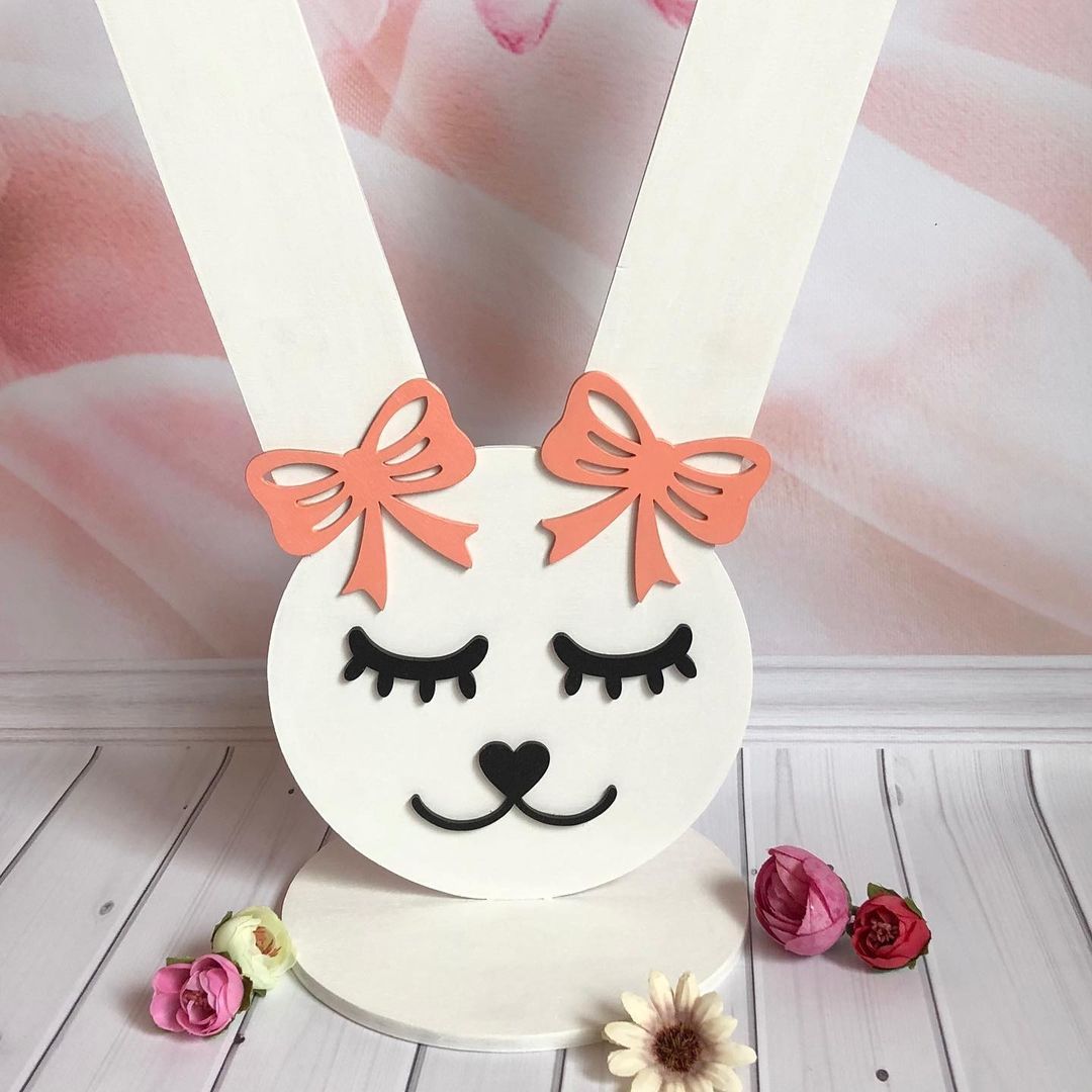 Laser Cut Bunny Rubber Bands And Hairpins Stand Free Vector