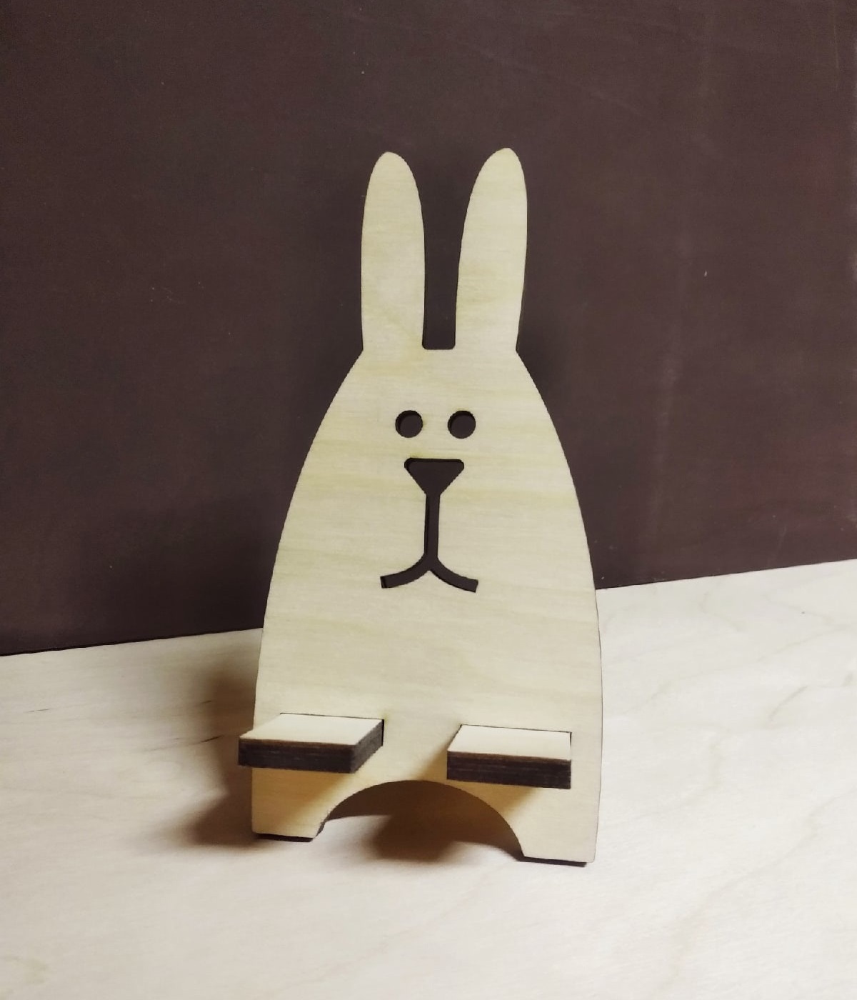 Laser Cut Creative Cute Rabbit Desktop Phone Stand Free Vector