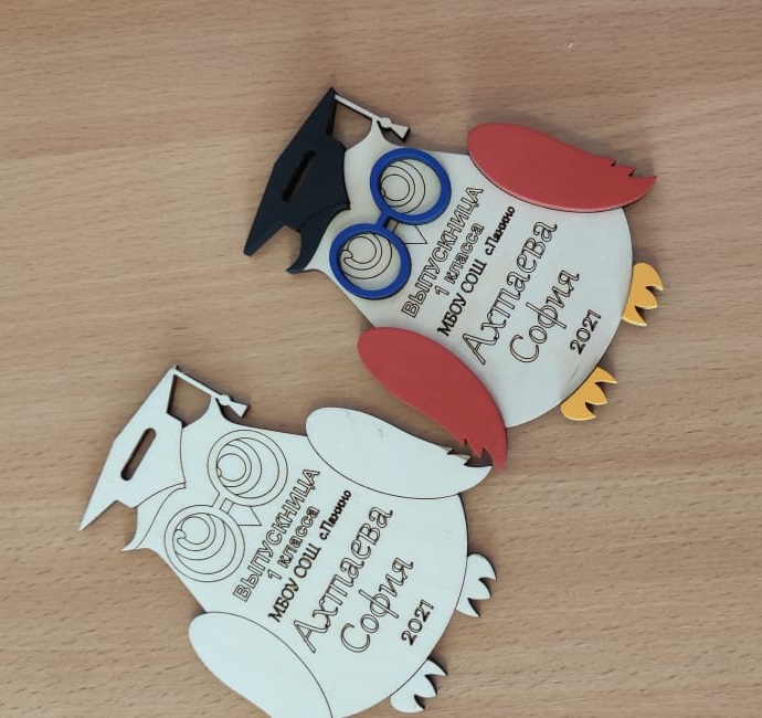 Laser Cut Owl Medal Free Vector